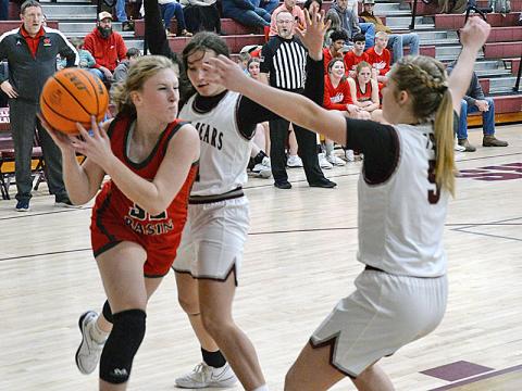 Copper Basin’s Cora Kimsey drives the lane for the Lady Cougars in previous action this year. She scored two points in the win over Polk County.