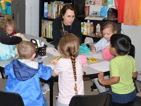 The students of Katie Ballew’s class are doing centers with their paraprofessional, Diane White during the local board training tour. Shown around the table from left to right are Andrew Davis, Annabelle Foraker, Anthony Vargas-Garcia, Journey Collis and White.