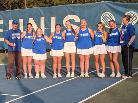 Coach Mark Miller, Maddie Schueneman, Kendra Newman, Izzie Jabaley, Anna Beth Minear, Kendall Clore, Lucia Martinez, Sydney German, and Coach Suzanne Pass, from left, are shown after the win over North Cobb Christian.
