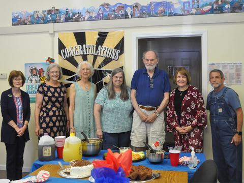 FLAG tutors were honored for their dedication and time spent helping others. Shown from left is, Director Teresa Ross, board member Carol Crawford, Executive Director Jill Key, board member and tutor Donna Earl, tutor Ed Wolpert, tutor Jeanette Rismiller, and board member and tutor Alan Schulman. Not pictured are tutors, Dawn Harding, Kathy Barber, and Ann Brayley.