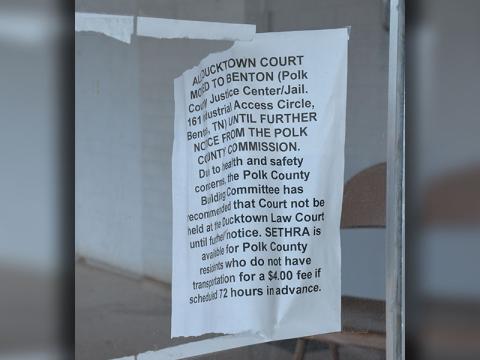 This announcement from November 2022 continues to barely hang on the front door of the Polk County courthouse in Ducktown. Commissioners will meet there this week as they work to build a new building.