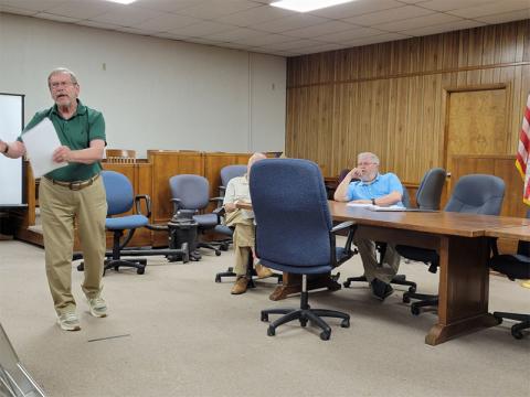 Paul Wright talks about the Ocoee Whitewater Center as Polk County IED Board member Buddy Haynes listens.