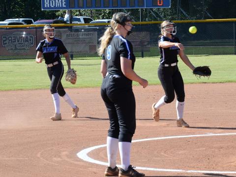Myla Rogers throws a runner out for the Lady Rebels from her shortstop position.