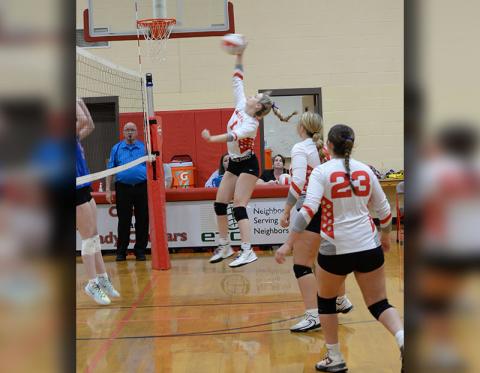 Alexis Hyatt (#1) goes for a kill in recent Copper Basin action. She led the team with five kills against North Georgia Christian Academy.