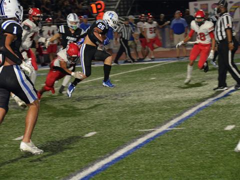 Carson Callihan (#25) has powered through opposing defenses all season for the Fannin County Rebels, as he does here in action earlier this year. Friday night the Rebel senior gained 301 yards in a game that pitted the last two undefeated teams in 7-A Division 1 against each other. 