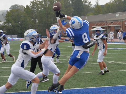 Judah Wood (#8) stretches to catch a Lawson Sullivan against the Gordon Central Warriors Saturday afternoon at Fannin County High School stadium. Wood had one catch in the game.