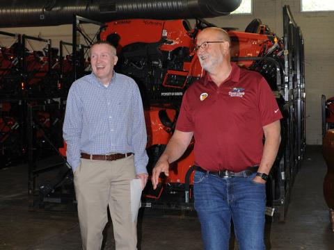 During the Whitepath building tour, FCDA Executive Director Erick Youngberg, right, guided attendees through the newly renovated warehouse which is currently being used by Mason Tractor. Pictured with Youngberg is FCDA board member Cory Callahan.