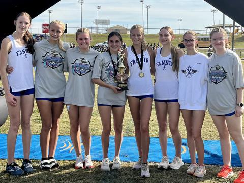 The Fannin County High School girls Cross Country team of, from left, Lana Hicks, Kensley Pickelsimer, Annaleigh Cheatham, Karli Sams, Lindsey Holloway, Lila Borum, Sydney Ford, and Claire Saxon.