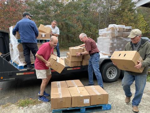 This dedicated group of volunteers are pictured unloading their first shipment of hams and turkeys for Feed Fannin’s Holiday Meals Campaign.