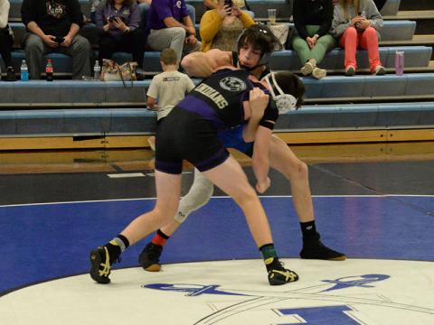 Fannin County wrestler Luke Cantrell battles his Lumpkin County opponent in a dual match last week. Cantrell wrestled in the 132-pound weight class.