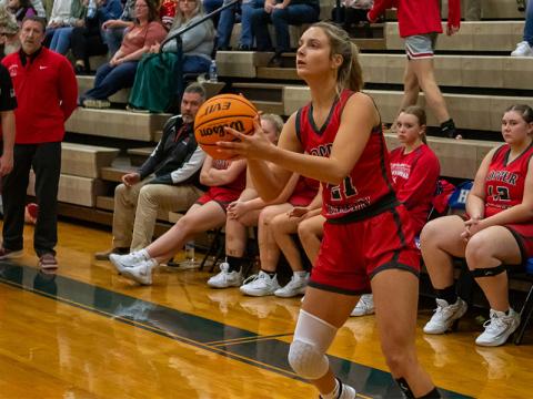 Alexis Hyatt (21) takes aim for seven of the points she scored for Copper Basin against Hiwassee Dam.