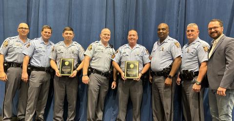 Shown following the award presentations are, from left, Captain Chad Johnson, Colonel Billy Hitchens, Matheson, Trooper First Class Aaron Deyton of Post 27, Bradburn, Lieutenant Colonel Kendrick Lowe, Major Douglas Wilson and McCaysville Police Chief Michael Earley, coordinator of the Appalachian Trail Traffic Enforcement Network.