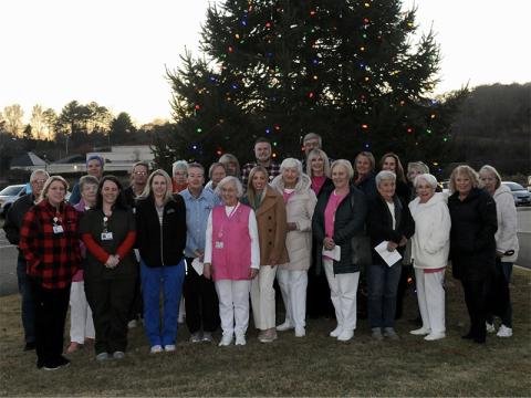 Shown at the Love Lights Tree Lighting ceremony are, from left, front row, Pam Satterfield, Bridgette Young, Jessica Thomason, Maureen Dalziel, Shirley Copeland, Natalie Hicks, Carole Thomas, Joyce Mitchell, Margaret Matthews, Laura Haight, Cindy Hicks and Carol Green; second row, left, Steve Cheatham, Barbara Cheatham, Lamanda Prince, Jean Bonnewitz, Rev. Carol Wade, Susan Kiker, Carmen Clines, Julie Shirah and Gilita Carter; third row, left, Amy Gill, Evelyn Hammond, Daniel Postell and Tim Snider.