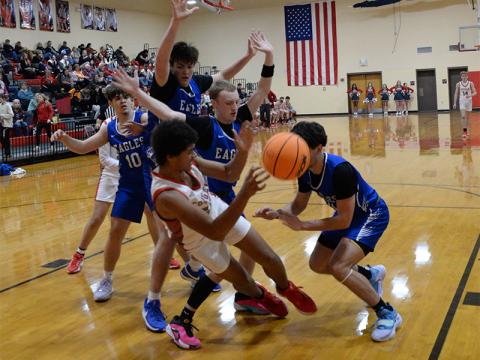 Copper Basin’s Darrius Harris fights to keep the ball in bounds for Copper Basin in recent action. The Cougars posted a big win last Monday when they traveled to Whitwell to face the Tigers.