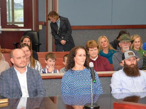 New Fannin County school board members Adam Born, Ashley Herendon Weeks and Robert Patterson, from left, wait Friday, January 3, to take their oaths of office.
