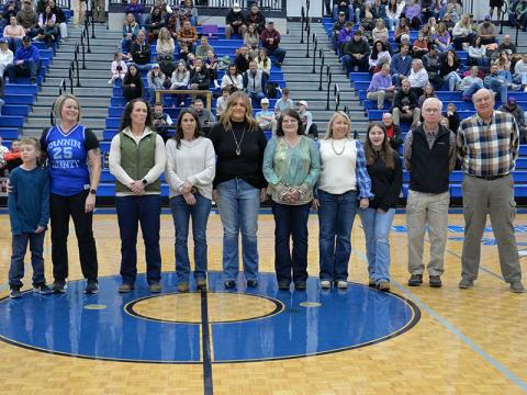 The 1995-1996 Lady Rebels basketball team will be inducted into the Fannin County Sports Hall of Fame this spring. The honor was announced Saturday between Fannin County’s basketball games against Union County. Present for the recognition were, from left, Katie Collins Taylor and her son Henry, Ashley Herendon Weeks, Melissa Holler Patton, Leslie Jabaley Mann, Kim Jones Ware, Roxie Reed Travato and her Daughter Riley, Coach Eddie Payne and Head Coach Johnny Farmer.