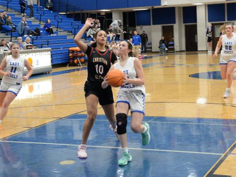 Avi Ethington drives the lane on the way to scoring two points for the Fannin County Lady Rebels.