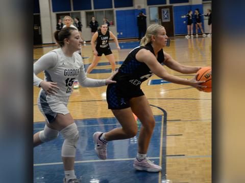 Emma Holloway outruns her Gordon Lee opponent to grab this rebound in action Friday night in the Fannin County High School gym. Buchanan was one of three Lady Rebel seniors playing their last regular season game on the home floor.