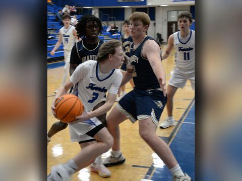 Hudson Ethington makes his way around a defender in the Rebels win over Brantley.