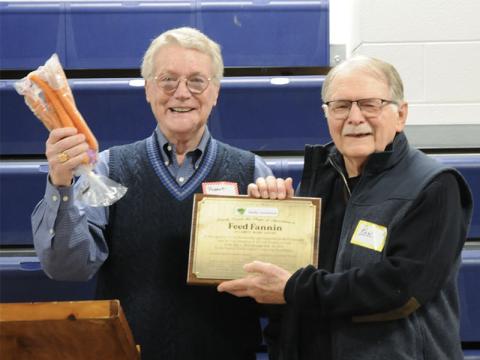 On behalf of Fannin County Family Connection board Vice Chair Robert Gleadall presented Feed Fannin with a “24 Carrot” award to show their appreciation. Feed Fannin Chair Ron Ciochon accepts the recognition.