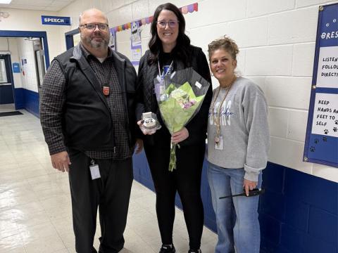 Megan Orton, middle, is Blue Ridge Elementary School’s 2026 Teacher of the Year. She is shown with Principal Mark Young and Assistant Principal Lisa Taylor.