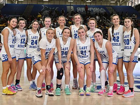 The Fannin County Lady Rebels advanced to the championship title game of the Georgia High School Association state basketball playoffs with a win Saturday over East Laurens. Shown after the win are, from left, front, Callie Ensley, Avi Ethington, Maggie Ledford, and Izzie Jabaley; and, back, Saige Turner, Toccoa Hampton, Saidee Patton, Emma Buchanan, Emma Holloway, Reese Lewis, Albany Cole, Brooklyn Owenby, Kendall Gaddis. 