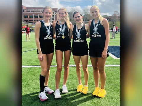 The Lady Rebels 4x800 meter relay team, from left, Ava Acker, Lindsey Holloway, Karli Sams and Kensley Pickelsimer, placed first in the Georgia Spring Break Showdown.