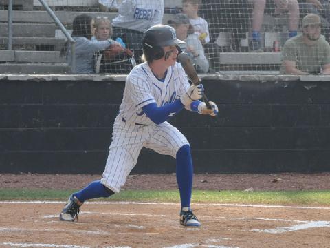 Elijah Weaver squares to bunt in a game against the Armuchee Indians.