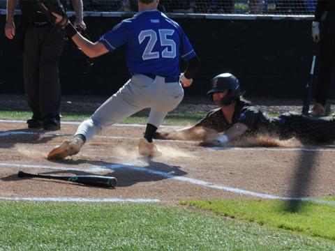 Rebels Senior Colton Gray slides into home during an April 15 game against Gordon Central.