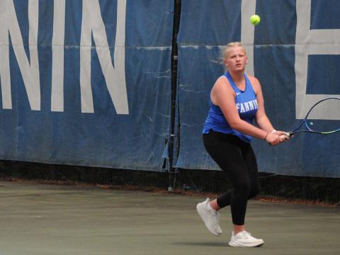 Kendall Clore lines up a shot in the Lady Rebels playoff win over Haralson.