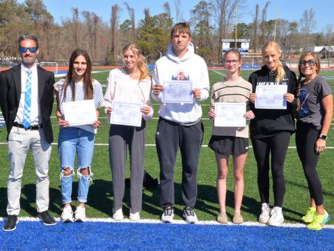Six Fannin County High School Cross Country athletes were named to the 2024 Rome All Area High School Cross country Team. Shown, with their coaches, are, from left, Coach Dr. Lucas Roof, Karli Sams, Linsdey Holloway, Rylin Davis, Sydney Ford, Kensley Pickelsimer, and Coach Miranda Roof. Not pictures is Lila Borum.