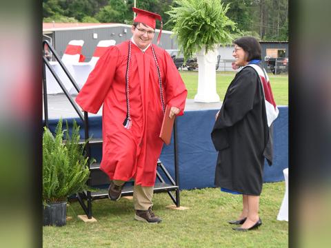 Copper Basin High School graduate Donovan Rose is all smiles after receiving his diploma during graduation exercises Thursday evening, May 15, at the school.
