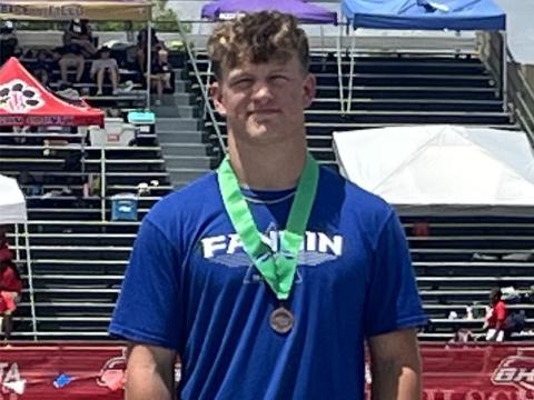 Cooper Born finished seventh in Discus during State Championship meet competition.
