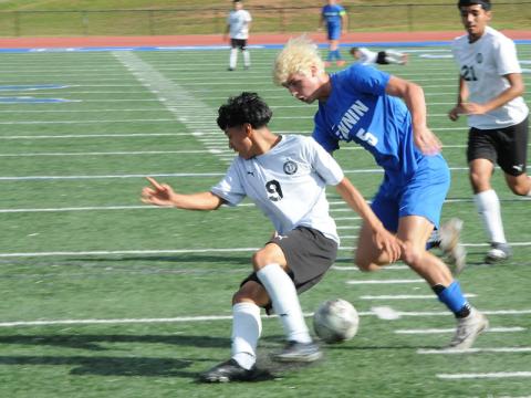 Fannin County’s Brevan Hennessey maneuvers against a Dalton player in a May 6 playoff game.