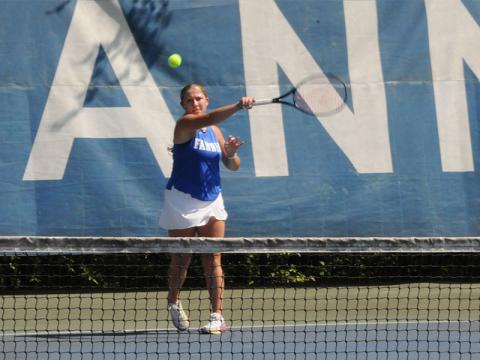 Lady Rebel Izzie Jabaley gets in a hit at an April 30 tennis match at Fannin County High School.