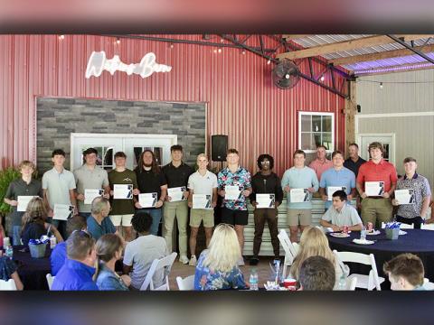 These members of the Fannin County High School Rebels Track & Field team were honored for maintaining a 3.5 grade point average or higher. Accepting their certificates at the team’s recent banquet were, from left, Aiden Jones, Henry Schueneman, Cayden Reece, Braxton Cheatham, Jacob Dye, Luke Holsonback, Conrad Head, Cooper Born, Ryan Preston, Lawson Sullivan, C.J. Reece, Isaac Watkins, and Baron Davenport.