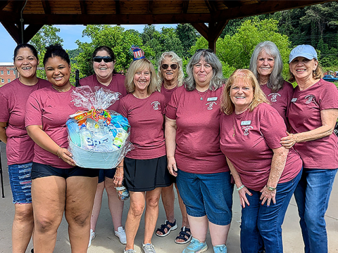 Fannin County Barking Buddies sponsored a free microchipping event at Toccoa River Park June 28. Members volunteered at the event and gave out free gift bags to guests. Volunteers who helped included, from left, Christina Nnaji, Emma Chambers, Debi Holcomb, Donna Turek, Marge Heald, Tina LaCombe, Meri Taylor, Donna McWilliams, and Sandy Taylor. 