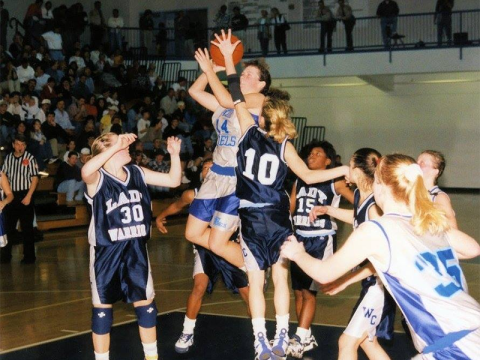 Top Offensive Player Ashley Herendon Weeks goes up for a basket during the Lady Rebels’ 1995-96 season.