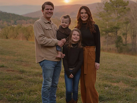 Tuff Born is shown happy and healthy as can be with his family, from left, father Jake, sister Baker and mother Michaela.