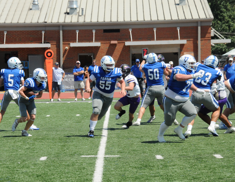 Fannin County’s Jasper Mealer (19) takes the handoff from Nate O’Neal (5) and heads around Union County defenders behind the blocking of Baylor Twiggs (55), Isaac Watkins (50), Jacob Green (77), and CJ Reece (23). The game was played Saturday afternoon in Blue Ridge after being postponed from the night before due to a shortage of officials.