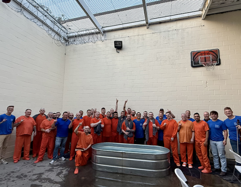 A second service held last Tuesday night, September 16, in the Fannin County Jail saw a large number of the male inmates baptized. They are shown here with Rev. Dr. Chan Mitchell of The Ridge Community Church, who conducted the service, and members of Breaking Chains ministry, regular visitors to the jail.