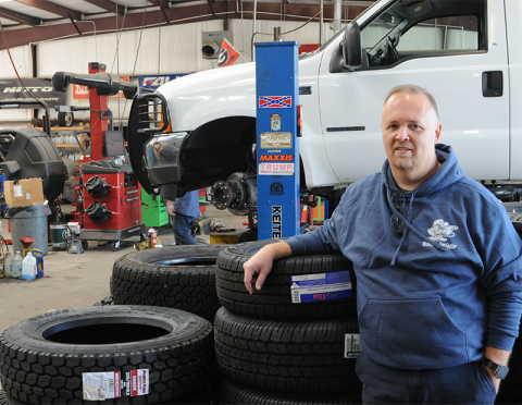 Tim Nicholson, a co-owner of Nicholson Tire Center, is shown at Nicholson Tire Center’s Damascus Road location, one of two that is part of the family business.