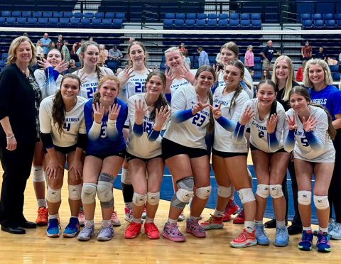 The Fannin County High School volleyball team has reached the Elite Eight and will play today, Wednesday, October 22, against top ranked Bremen. Pictured after the win over Lamar County are, from left, front, Shannon Powell, Amberly Patterson, Keslei Kea, Maya Butler, Maggie Ledford, Karleigh Hurd, Maddie Partin; and back, Head Coach Suzianne Pass, Taber Pass, Addelyn Barnes, Karis Hurd, Kendall Clore, Audrey Veal, Jordan Deal and Madi Raines.