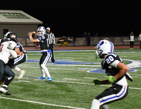 Conrad Holloway eyes Braxton Cheatham as the Fannin County Rebels looked to pick up yardage against Christian Heritage Friday night in Blue Ridge.