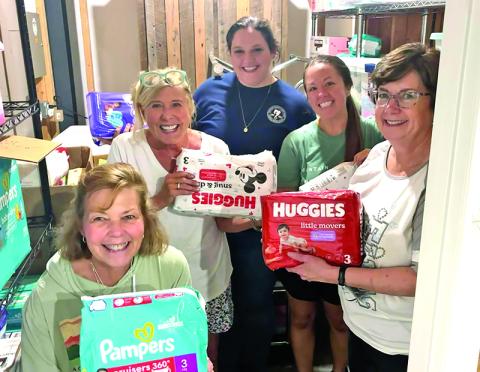 Some of the ladies behind Fostering Fannin are shown in their element, from left, Sally Masters, Swan McKnight, Stacie Hamlin, McKenzi Farris and Jan Wheeler.