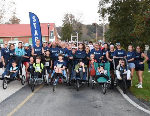 In-chair athletes and their push-assist partners line up for Saturday’s Bigfoot Boogie in the twin cities of McCaysville and Copperhill. They are members of the Kyle Pease Foundation, which empowers individuals with disabilities through inclusive sports experiences. (See next week’s issue of The News Observer for the complete Bigfoot Boogie wrap up).