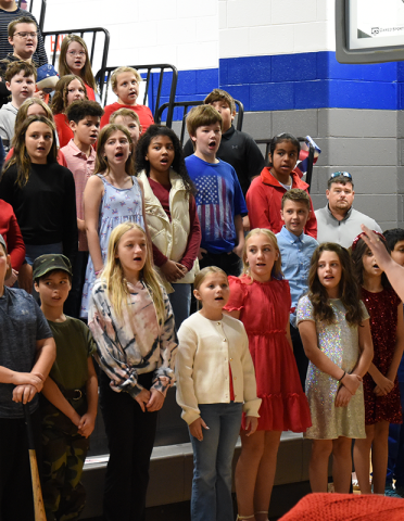 Students at Blue Ridge Elementary performed a variety of patriotic songs during the Veterans Day celebration at the school. U.S. Marine Corps veteran Sergeant Brent Ware told the students that he learned, “never, never give up,” and that should translate into their lives.