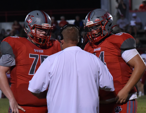 Copper Basin’s Dylan Beaver (75) and Cooper Floyd (64) get instructions during recent Cougar action.