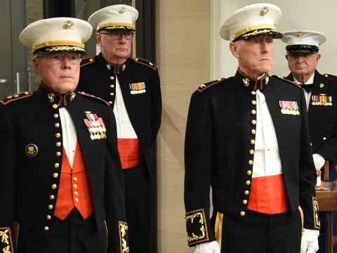 Preparing to begin the official ceremony at the Marine Corps Ball and 250th Birthday Celebration Saturday night are, from left, Major General Robert Flanagan, Lieutenant Colonel Dale Greene, Colonel Mike Nunally and 1st Sergeant Thom Potito (all retired). 