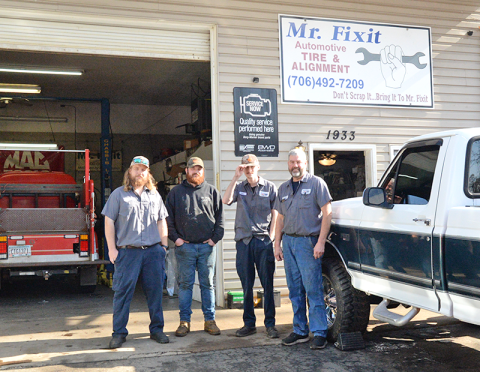 Mark Keaton, far right, and his staff of, from left, Chris Beaver, Lee Reeves and Evan Chastain believe in making customers happy.